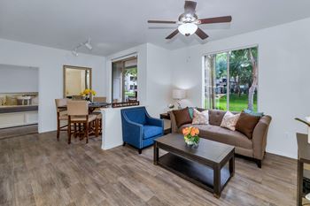 Living room and dining area with patio access